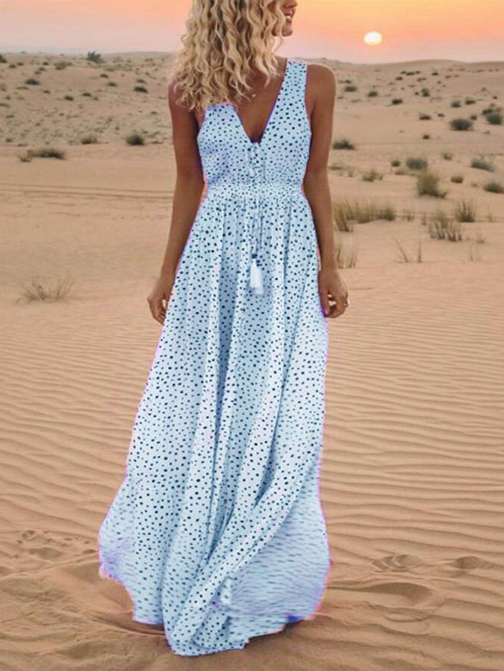 Maxi| Lange mouwloze bohemienrok met V-hals en stippen