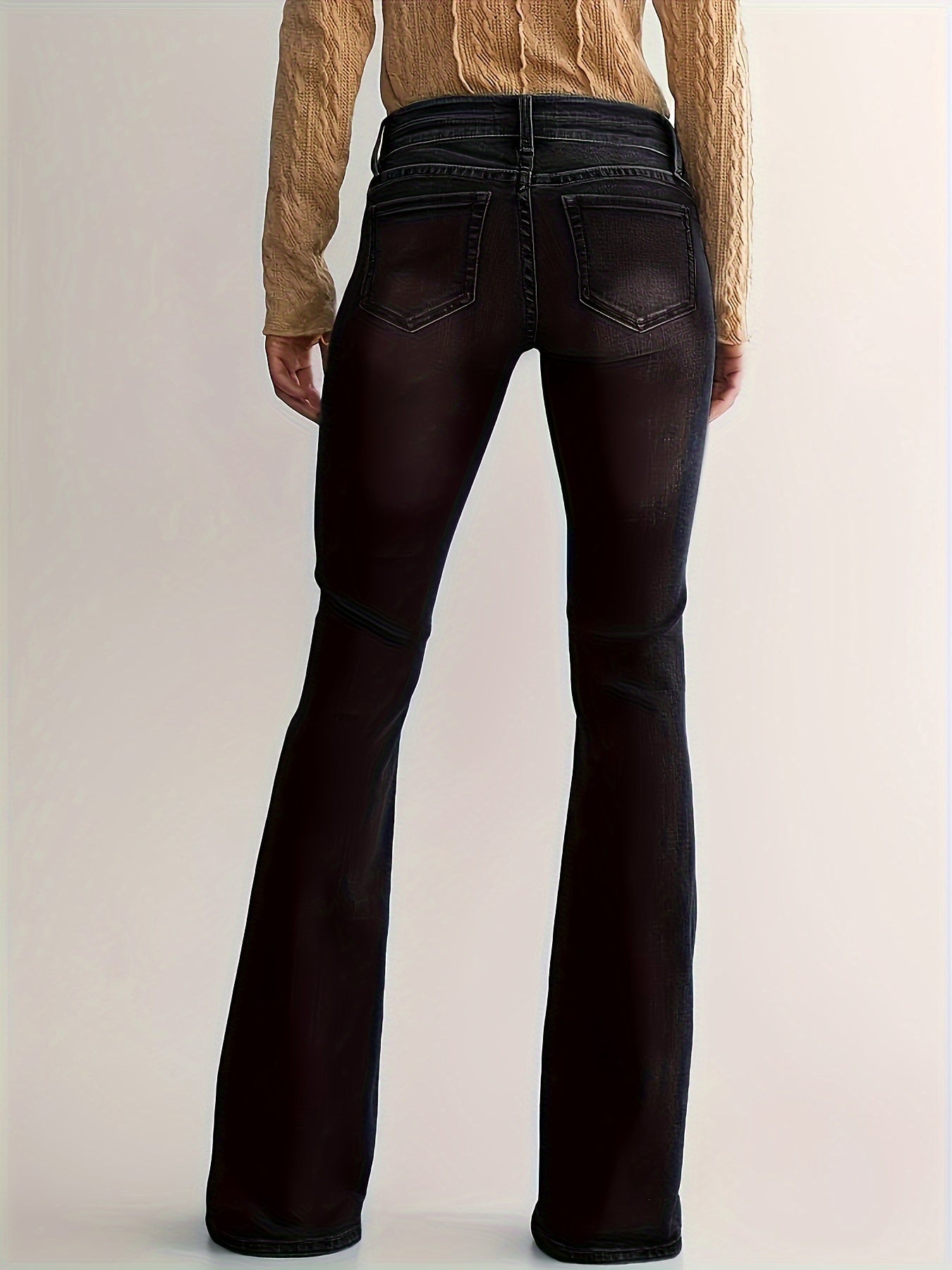 Eva | High-waist flared jeans met dubbele knoopsluiting