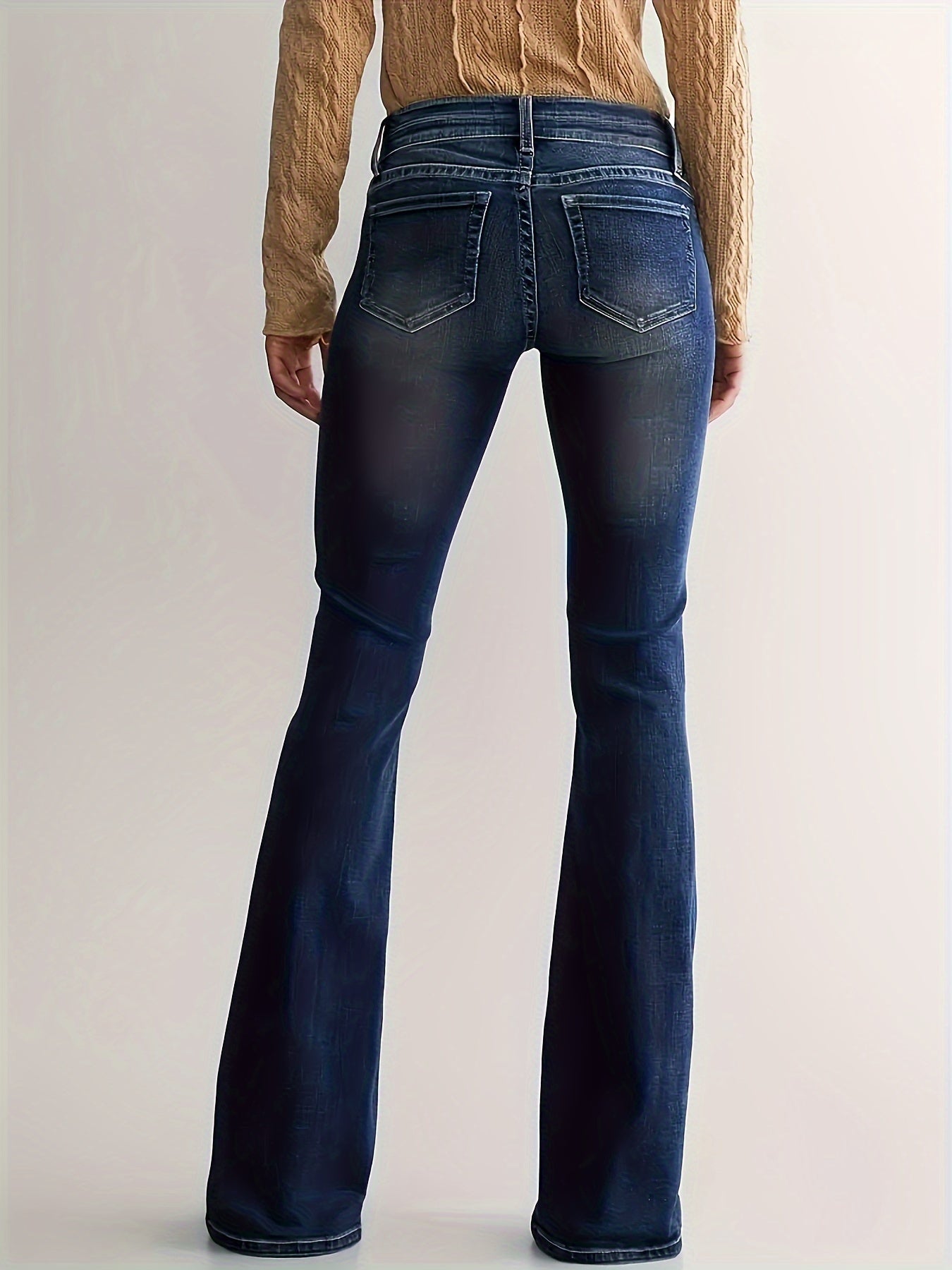 Eva | High-waist flared jeans met dubbele knoopsluiting