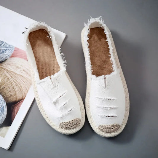 Laurynn | Zwarte en witte espadrilles van gescheurde canvas stof